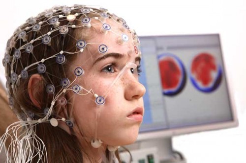 Electroencephalograms (EEGs) record electrical activity along the scalp through  electrodes. Photo courtesy of Cognitive Consonance.