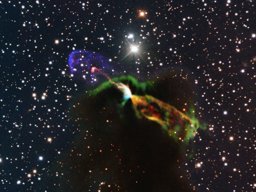 This unprecedented image of Herbig-Haro object HH 46/47 combines radio observations from the Atacama Large Millimeter/submillimeter Array (ALMA) with much shorter wavelength visible light observations from another telescope. Courtesy of the European Southern Observatory.