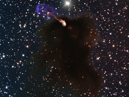 This image shows the Herbig-Haro object HH 46/47 as jets emerge from a star-forming dark cloud. Courtesy of the European Southern Observatory.