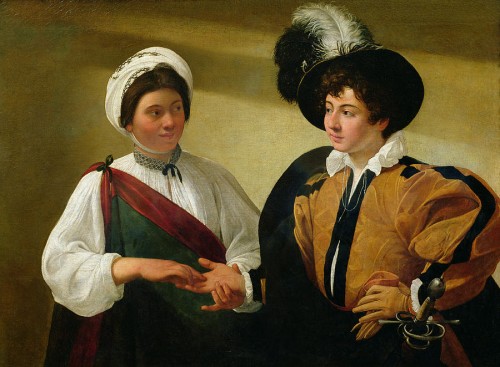 Two figures lock eyes in Caravaggio’s “The Fortune Teller.” Courtesy of Fine Art America.