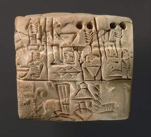 A tablet from Mesopotamia, circa 3100-2900 BC, depicting the distribution of barley. Image courtesy of the Metropolitan Museum of Art.