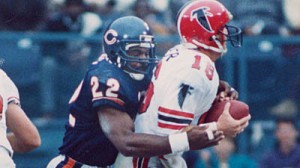 Dave Duerson makes a tackle during his time with the Chicago Bears. Image courtesy of Chicago Tribune. 