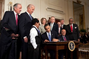 President Obama signs the Patient Protection and Affordable Care Act into law. Courtesy of Wikimedia Commons.